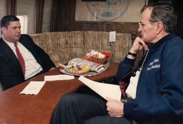 Former Chester County Commissioner Earl Baker, left, sits aboard Air Force Two with then Vice President George H.W. Bush.