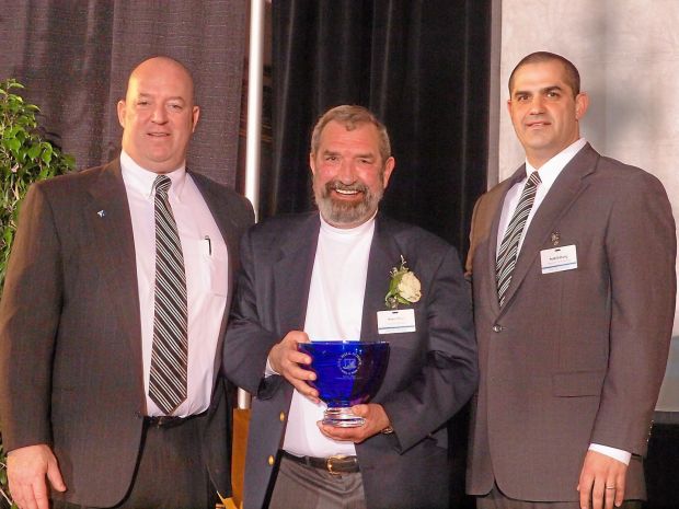 Hill School Athletics Hall of Fame honoree Harry Price, who died at age 86 early Wednesday morning, center, poses alongside former Hill School Headmaster Zack Lehman, left, and Director of Athletics Seth Eilberg following the school's inaugural induction ceremony. Price was one of 17 members selected to the Founders Hall, a one-time class of for former coaches, players and athletic directors who had a lasting impact on Hill athletics. (Photo courtesy of The Hill School)