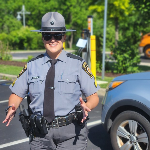 Pennsylvania State Police Cpl. Kelly MacIntyre, of the Office of Community Engagement, performs a mock traffic stop for young drivers in West Whiteland. (BILL RETTEW/MEDIANEWS GROUP)