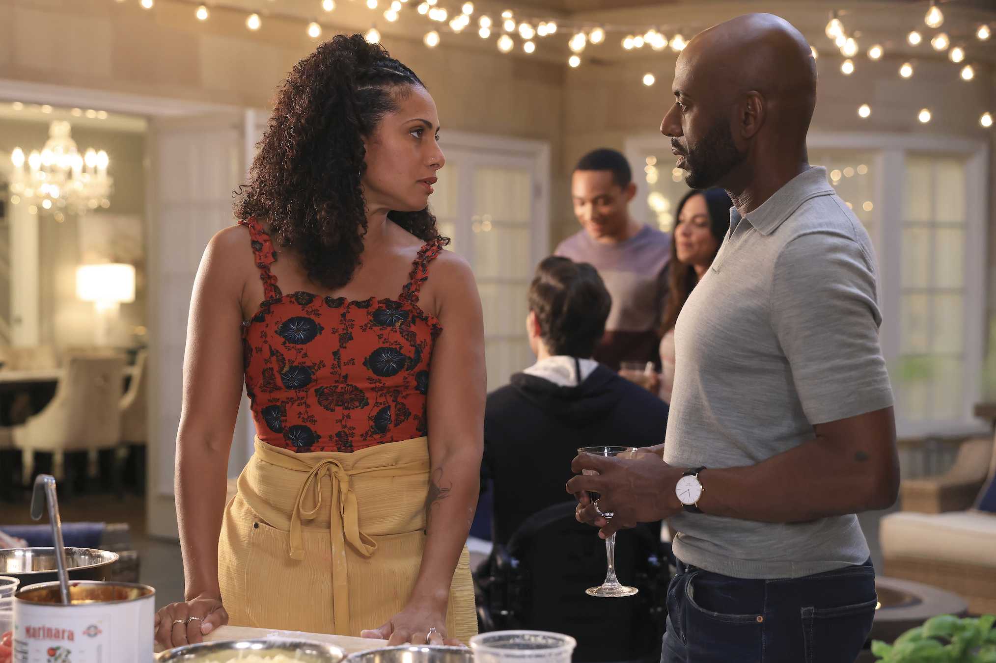 Christina Moses as Regina, Romany Malco as Rome in A Million Little Things