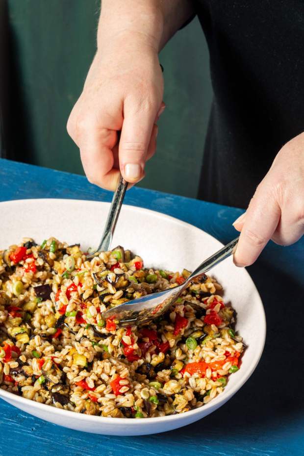 Nutty, earthy farro is one of the fastest-cooking whole grains around, and it works to make the perfect good-for-you Farro Salad With Roasted Eggplant. (Courtesy of America's Test Kitchen)