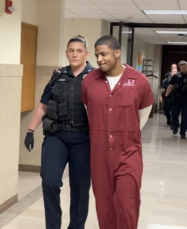 Jerry Butler is escorted by a deputy sheriff from his arraignment hearing on murder and robbery charges in Montgomery County Court on April 23, 2024. (Photo by Carl Hessler Jr. - MediaNews Group)