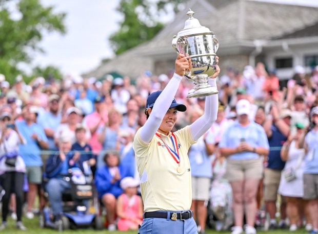 Yuka Saso lifts up the trophy for the fans in attendance at the ceremony following her win at the 2024 U.S Women's Open at Lancaster Country Club. (COURTESY OF BILL SNOOK)