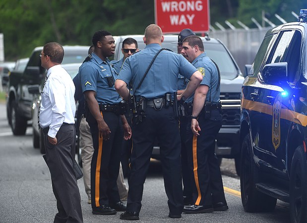 Delaware State Police at the scene in Chester. (PETE BANNAN-DAILY TIMES)