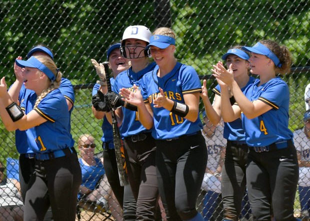 East's Lily Waterer greeted at home following her solo home run (BILL RUDICK for MeidaNews Group)