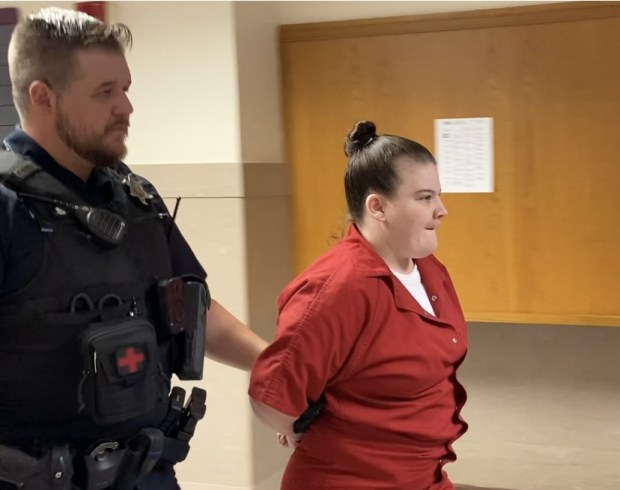 A deputy sheriff escorts Katherine Emel to a Montgomery County courtroom on June 21, 2024, for her guilty plea hearing. (Photo by Carl Hessler Jr. - MediaNews Group)