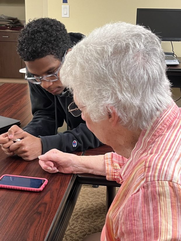 Students in Kim Reinard's computer classes at Conestoga Christian School have been helping seniors at The Heritage of Green Hills better understand the capabilities of their smartphones and tablets as part of a year-end project. (Courtesy of the Heritage of Green Hills)