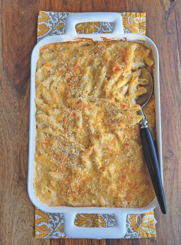 Baked Four- Cheese Macaroni: This crispy-topped and creamy-centered macaroni and cheese features four cheeses that take the company-size side dish to the next level. (Courtesy of Adventure Publications)