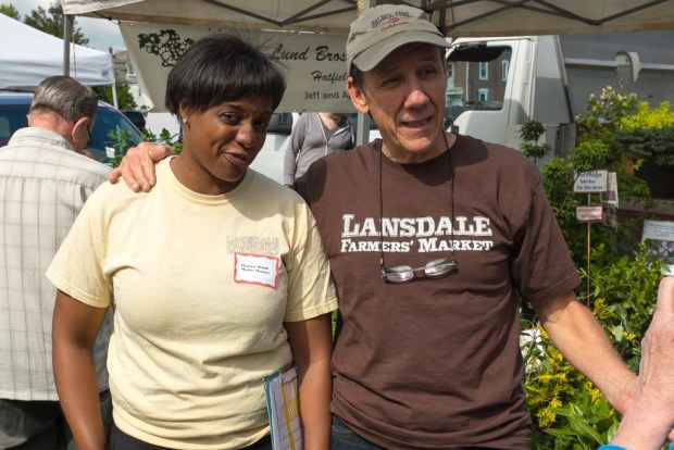 Charisse McGill, left, then-Manager of the Lansdale Farmers' Market, and longtime market volunteer Rege McKenzie in 2014. (Photo courtesy of Lansdale Farmers' Market)