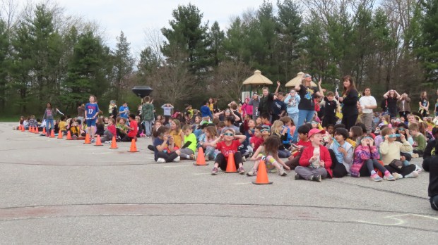 Students at Gwynedd Square Elementary School in Upper Gwynedd wear solar eclipse glasses provided by Merck to watch the solar eclipse on Monday, April 8 2024. (Dan Sokil - MediaNews Group)