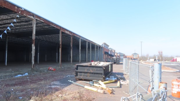 An empty shell of a building stands next to new facades on vacant storefronts in the former Towamencin Village Shopping Center, as seen on Tuesday, Feb. 27 2024. (Dan Sokil - MediaNews Group)