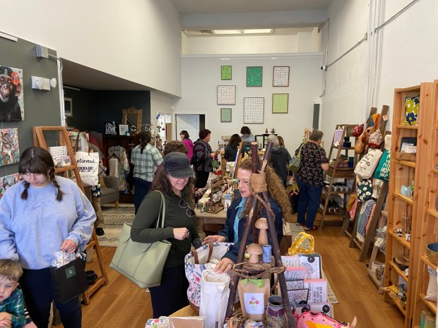 Shoppers crowd the floor of The Collective during the May 11 opening. (Evan Brandt -- MediaNews Group)