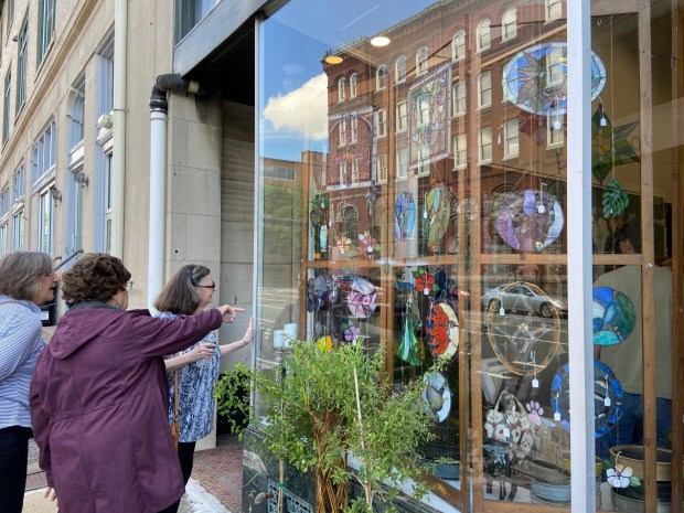 Shoppers check out the main display during The Collective's grand opening on May 11. (Evan Brandt -- MediaNews Group)