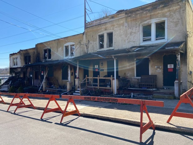 Barricades set up by the borough kept onlookers to the fire scene from getting too close. (Evan Brandt -- MediaNews Group)