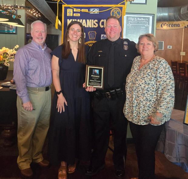 Lower Merion Police Officer Michael Pleasants with his wife and parents. (Photo courtesy of Main Line Kiwanis Club)