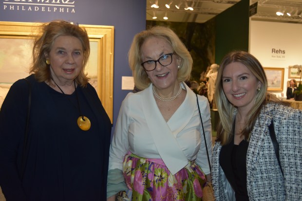 Julie Jensen Bryan, event benefactor, Melissa Hancock and Leigh Feliz enjoy the antiques and art at the Philadelphia Show this spring. (Photo by Maggie Corcoran)