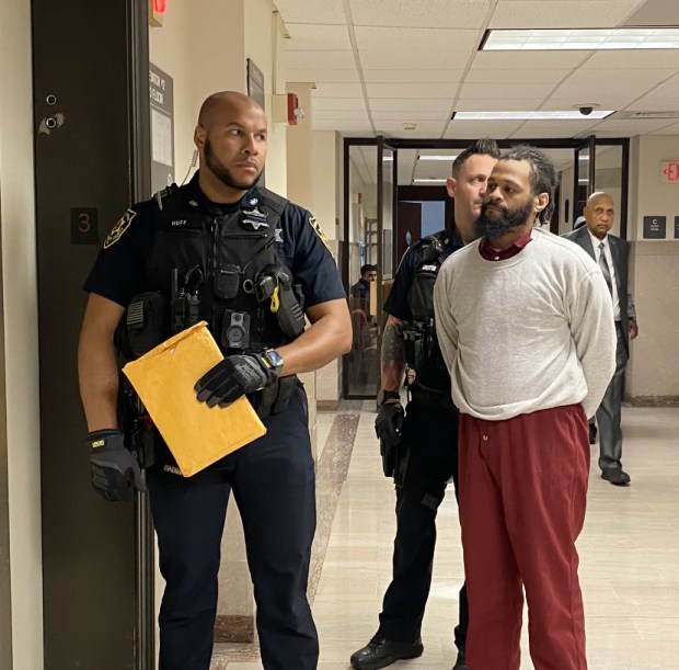 Sheriff's deputies escort accused Pottstown killer Kevin Morgan from a Montgomery County courtroom after his formal arraignment hearing. (Photo by Carl Hessler Jr. - MediaNews Group)