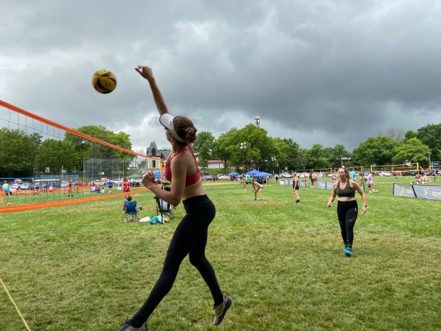 Thunderheads loom over the Pottstown Volleyball Rumble in Memorial Park Saturday. (Evan Brandt -- MediaNews Group)