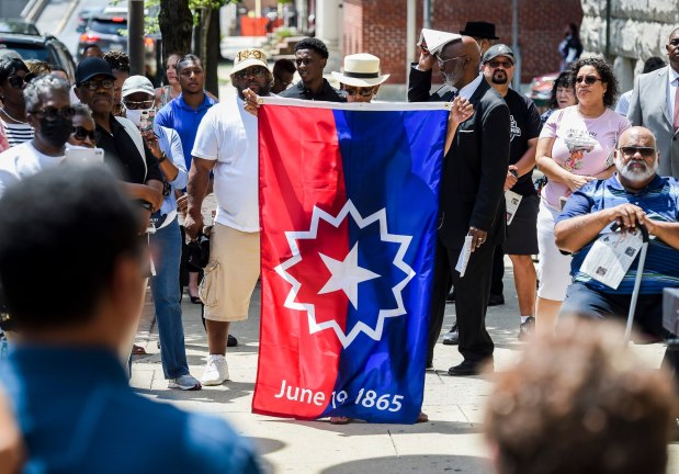 A flag raising is often a part of Juneteenth observances. (READING EAGLE)