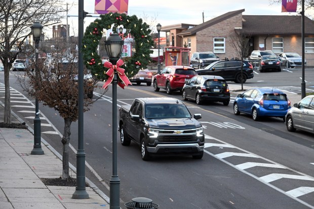 Traffic moves along Penn Avenue in West Reading as the holiday rush begins. (BILL UHRICH - READING EAGLE)