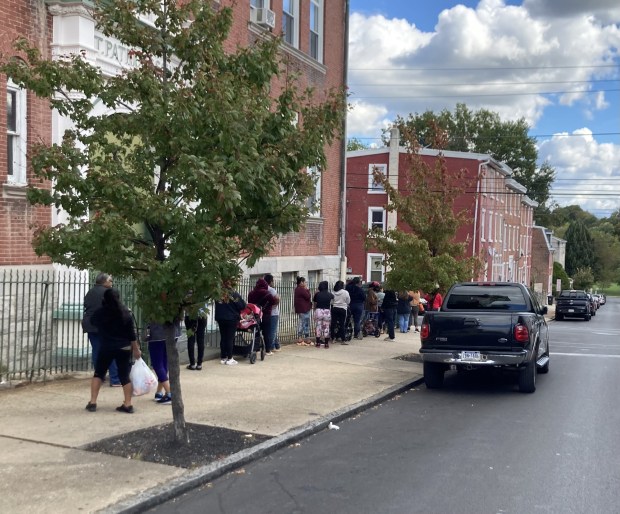 On a typical Food Cupboard day at the Patrician Society in Norristown, people will line up before the 1 p.m. opening. The line typically extends around the corner and up Chestnut Street (Photo courtesy of the Patrician Society)