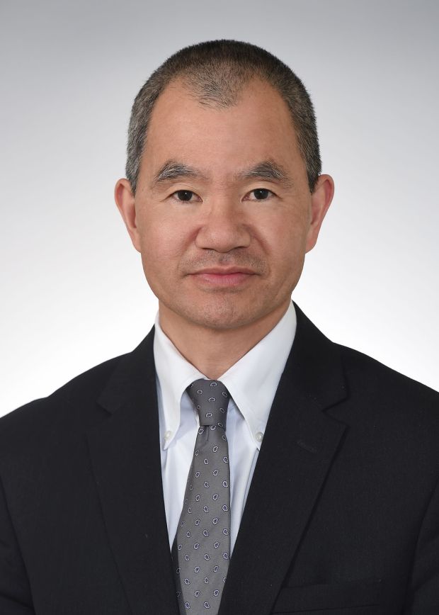 Head and shoulders of Dr. Ming Wang