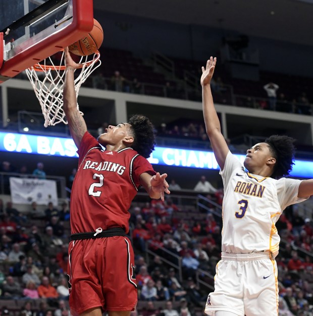 Reading High's Ruben Rodriguez scores on a fast break against Roman Catholic in the Red Knights' 63-56 overtime win in the PIAA Class 6A Final Saturday in the Giant Center. (BILL UHRICH - READING EAGLE)