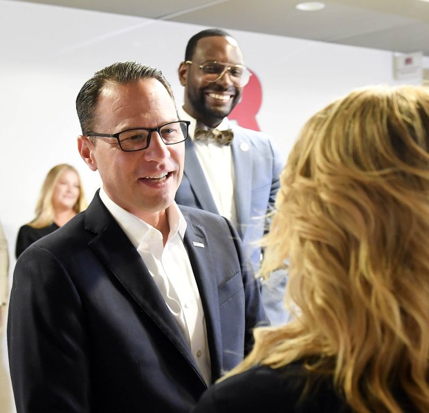 Gov. Josh Shapiro and Sec. of Education Dr. Khalid Mumin greet Reading School District Superintendent Dr. Jennifer Murray Friday during a visit to Millmont Elementary School. (BILL UHRICH - READING EAGLE)