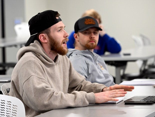 Sophomore Will White of Scotch Plains, N.J., discusses Taylor Swift's marketing strategies during a Promoting the Popstar class at Alvernia University's CollegeTowne Campus. (BILL UHRICH - READING EAGLE)