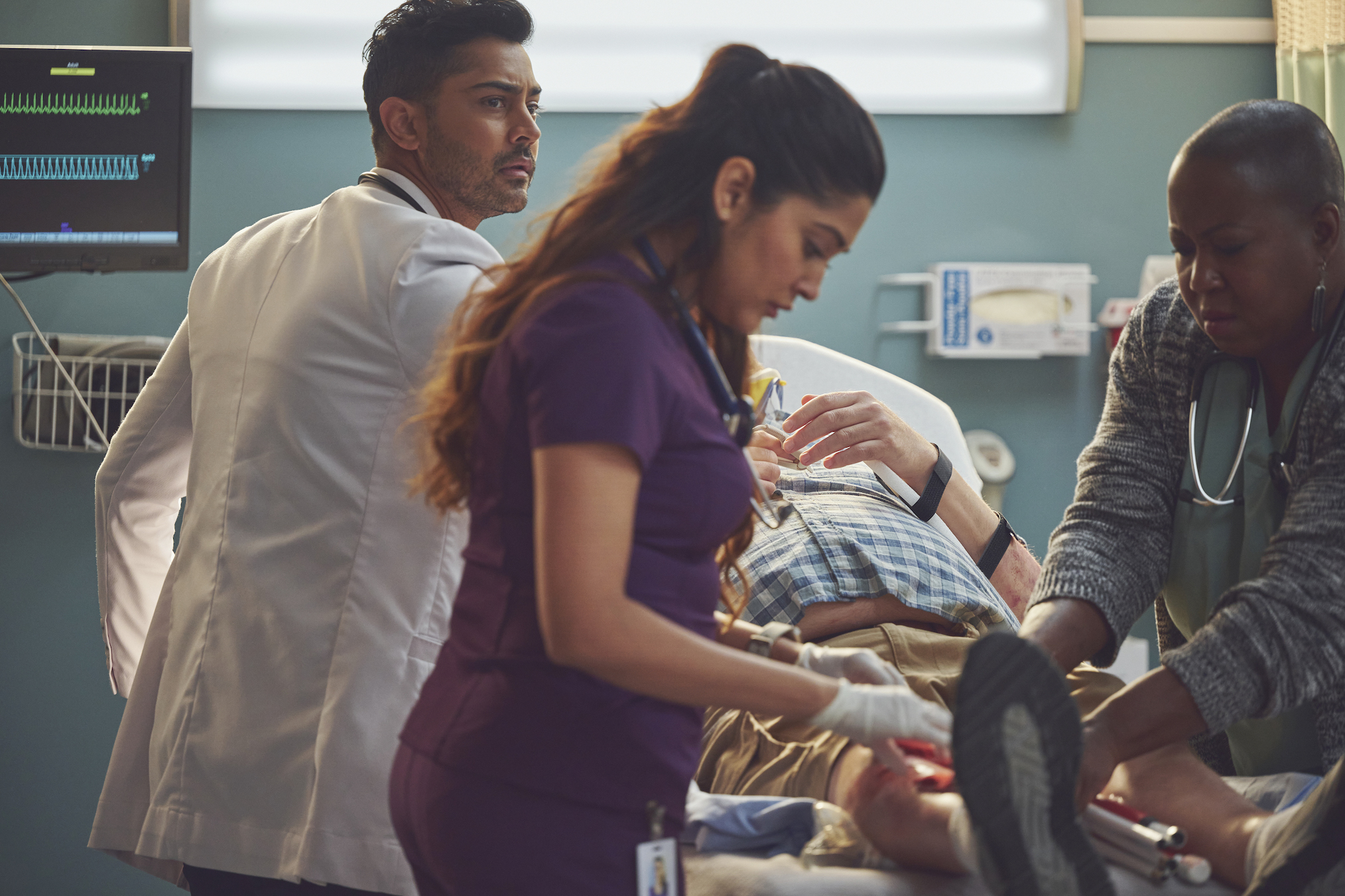 Manish Dayal as Devon, Anuja Joshi as Leela in The Resident