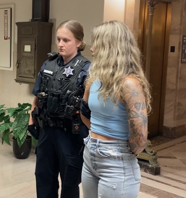 Carly Sasala is escorted by a deputy sheriff from a Montgomery County courtroom on June 7, 2024, after she was sentenced to prison for vehicular homicide. (Photo by Carl Hessler Jr. - MediaNews Group)