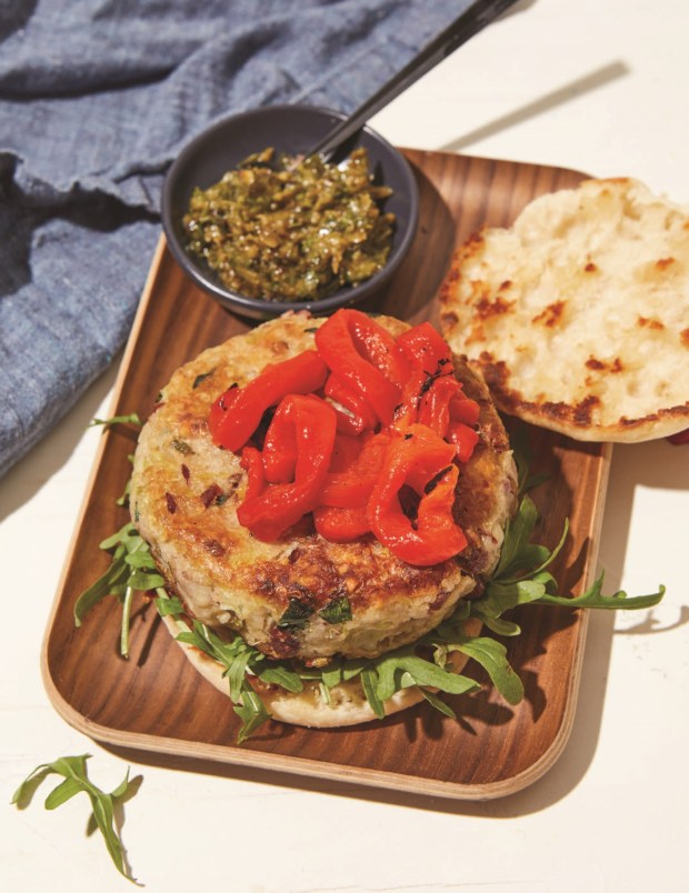 Quinoa, Red Bean, and Walnut Burgers. Cooking with the pomegranate sesame sauce creates a tart and nutty glaze on the burger makes it unique. (Photo by Evi Abeler)