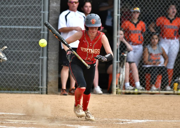 WC East;s Ava Cross heads to first on a bunt (BILL RUDICK for Media News Group)